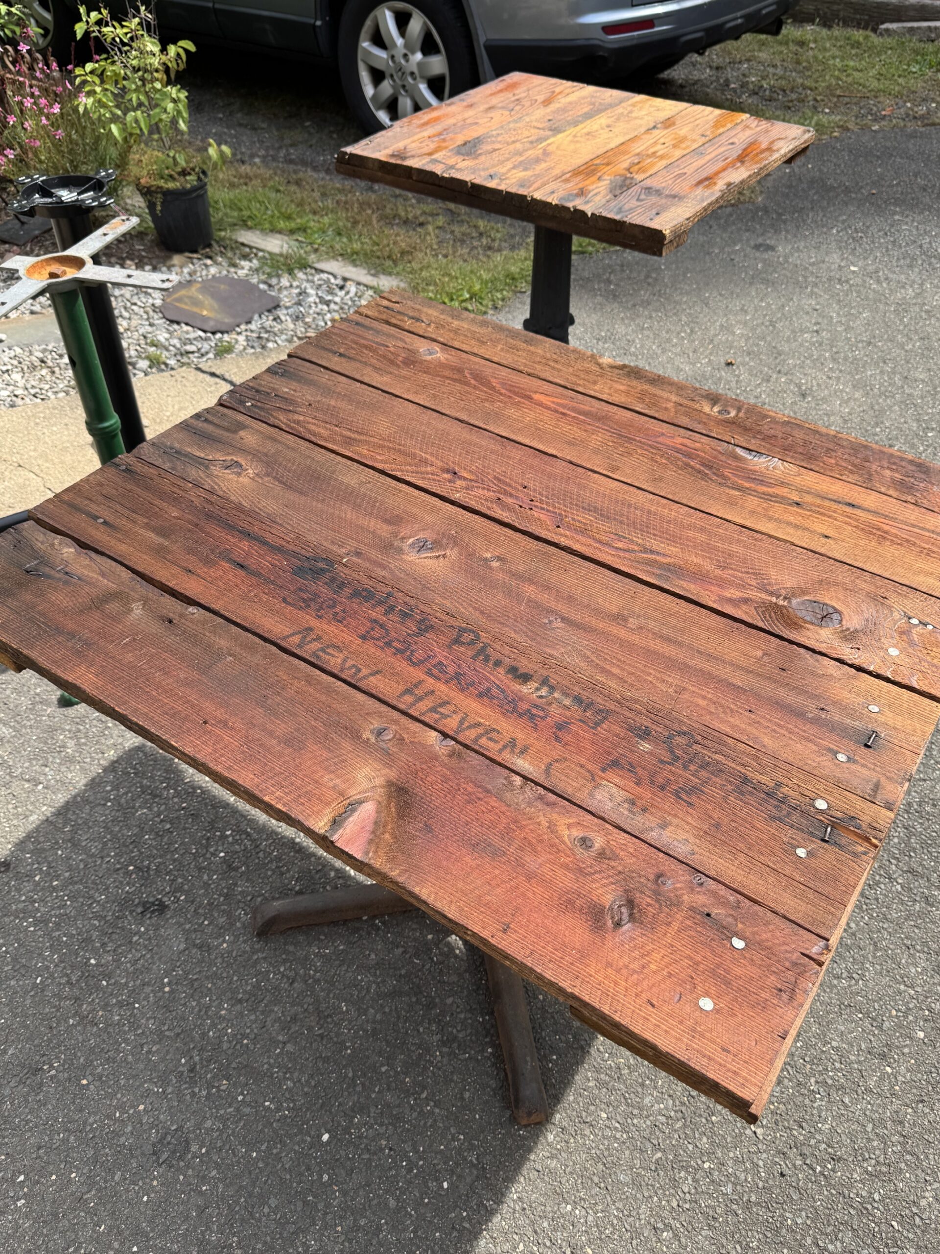 tables ,reclaimed materials, rustic.